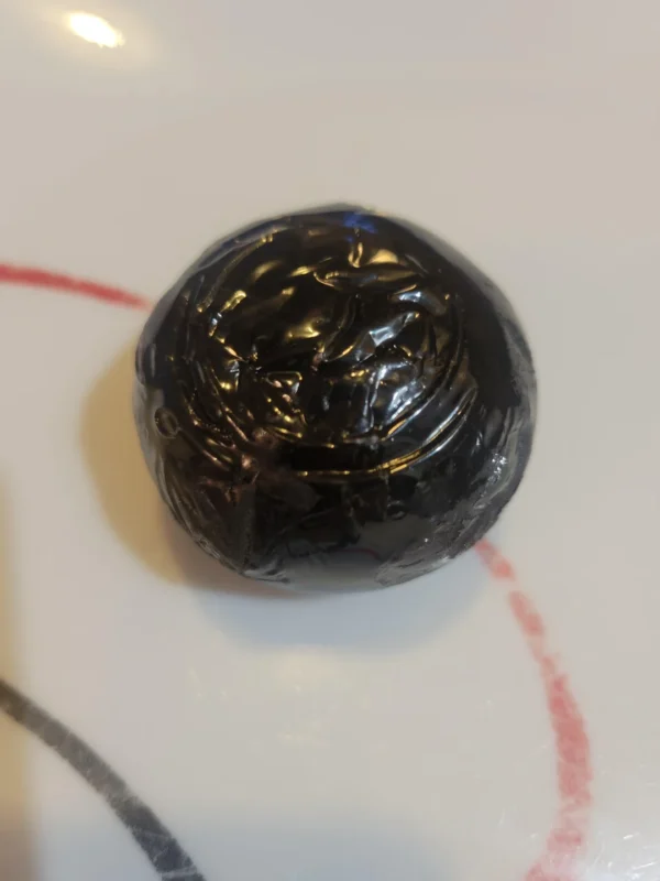 "Nepalese Temple Ball hash for sale in the UK – premium hand-rolled hashish with rich aroma and traditional Himalayan craftsmanship"